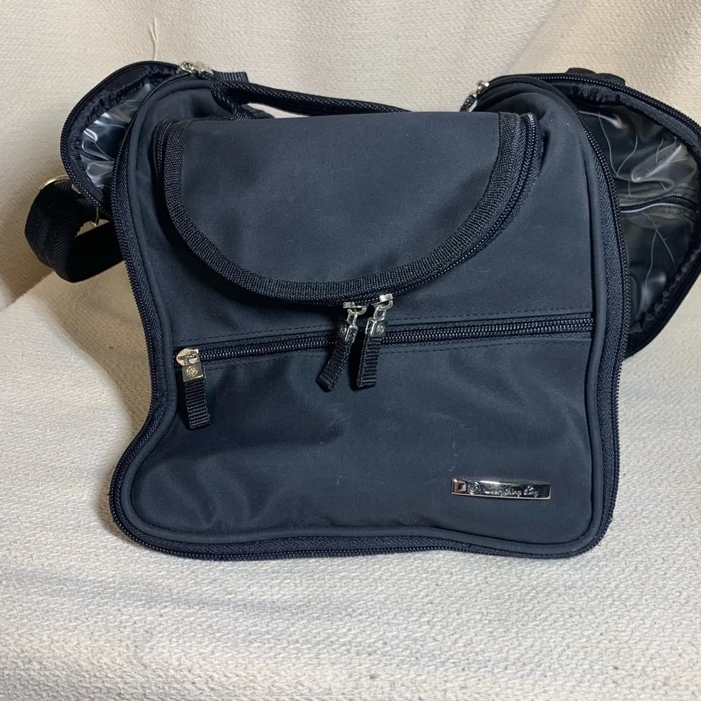 black travel bag for make up or toiletries